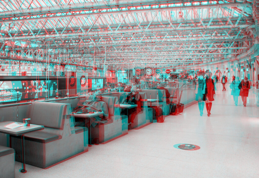 Red and cyan stereoscopic anaglyph of a modern London station interior
